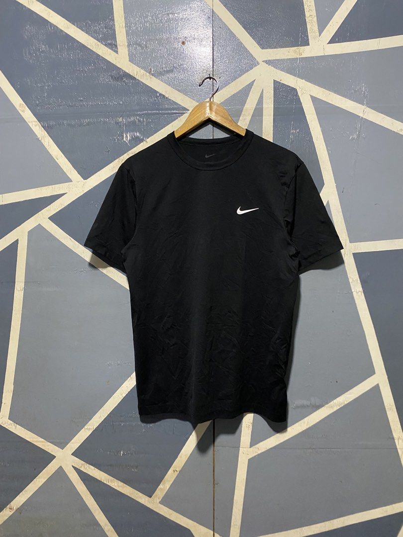 Nike Dri-FIT Black T-Shirt Medium (Category: Tshirts & Polo Shirts ) located in Polomolok. Submitted by marrssz (Listing ID 1470743871, Image 1). Description: - Brand: Nike - Style: Dri-FIT Crewneck T-Shirt - Color: Black with small white Swoosh logo - Size: Men's Medium (Standard Fit) - Material: 100% Lightweight & Breathable Polyester - Condition: Excellent / Pre-loved - Ideal for: Gym workouts, sports, or casual streetwear - Origin: Made in Ca