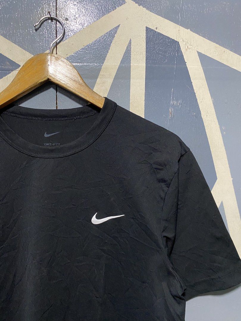 Nike Dri-FIT Black T-Shirt Medium (Category: Tshirts & Polo Shirts ) located in Polomolok. Submitted by marrssz (Listing ID 1470743871, Image 3). Description: - Brand: Nike - Style: Dri-FIT Crewneck T-Shirt - Color: Black with small white Swoosh logo - Size: Men's Medium (Standard Fit) - Material: 100% Lightweight & Breathable Polyester - Condition: Excellent / Pre-loved - Ideal for: Gym workouts, sports, or casual streetwear - Origin: Made in Ca