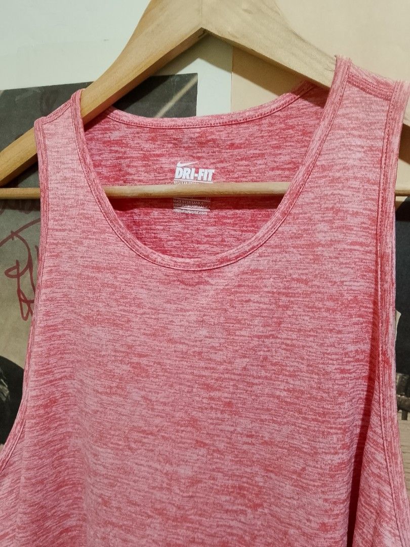 Nike Dri-FIT Red Athletic Tank Top XL (Category: Activewear) located in Manila. Submitted by emmanlacno47414 (Listing ID 1470749949, Image 3). Description: XL on tag Best fit large Width 23 Length 27 No issue/No flaws 10/10 Colorate Excellent Condition 350 flus sf.