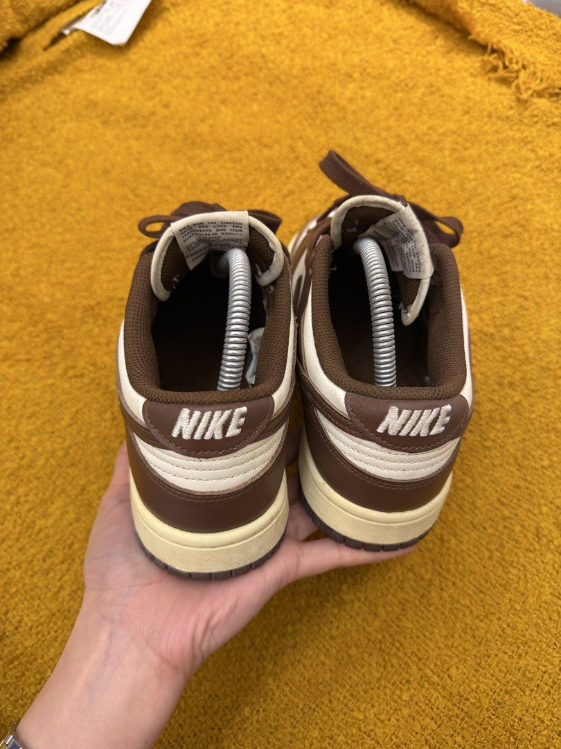 Nike Dunk Low “Cacao Wao” (Category: Sneakers) located in Baguio. Submitted by lovelyysam56061 (Listing ID 1470764802, Image 2). Description: - Colorway: Baroque brown and white - Style: Low-top with classic leather build - Details: Brown laces, matching outsole, and vintage-style aged midsoles - Craftsmanship: Clean stitching along the panels - Inclusions: Shoe trees included for shape maintenance.