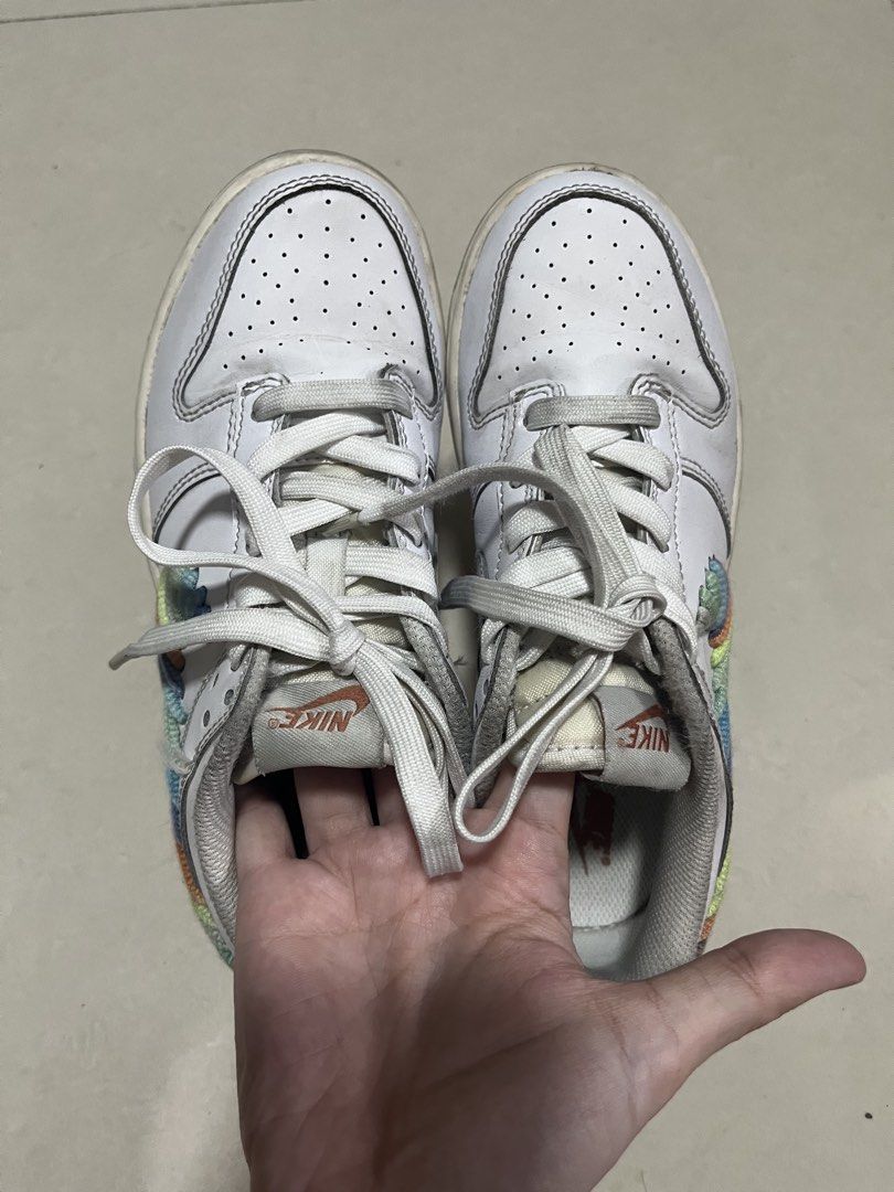 Nike Dunk Low Retro White Multicolor Kids Sneakers (Category: Babies & Kids Fashion) located in Pasig City. Submitted by uyin7 (Listing ID 1470874177, Image 1). Description: White Nike Dunks with colorful braided swoosh details. Size 2.5Y. White laces and gum soles. Worn condition with some dirt marks on midsoles and soles. Grab them today..