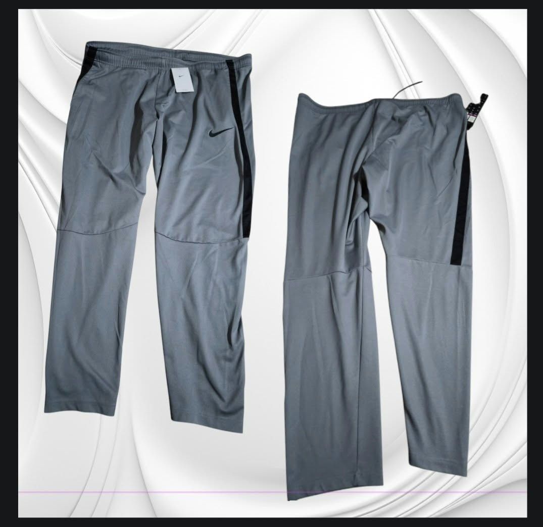 Nike Gray Athletic Pants Sweatpants (Category: Joggers) located in Paranaque City. Submitted by calm_youngstore7 (Listing ID 1470766615, Image 2). Description: LAST PIECE SALE! SIZE 3XL - Brand new with tags (BNWT) - Color: Gray with stylish black side stripes - Comfort fit: Elastic waistband with adjustable drawstring - Signature look: Embroidered Nike swoosh logo on the left leg - Fit: Standard fit for everyday comfort and athletic use.