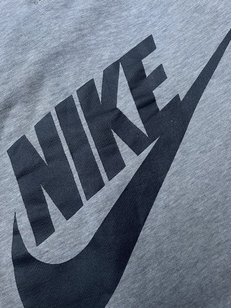 Nike Grey Cotton Fleece Shorts (Category: Shorts) located in Cebu City. Submitted by pinoclifford (Listing ID 1470834956, Image 2). Description: - Brand: Nike - Item: Grey shorts with black graphic logo - Size: Large (L) - Material: 80% Cotton, 20% Polyester - Features: Adjustable drawstring waistband and two functional side pockets - Origin: Made in Malaysia - Style Code: 728206-063 - Condition: Excellent.