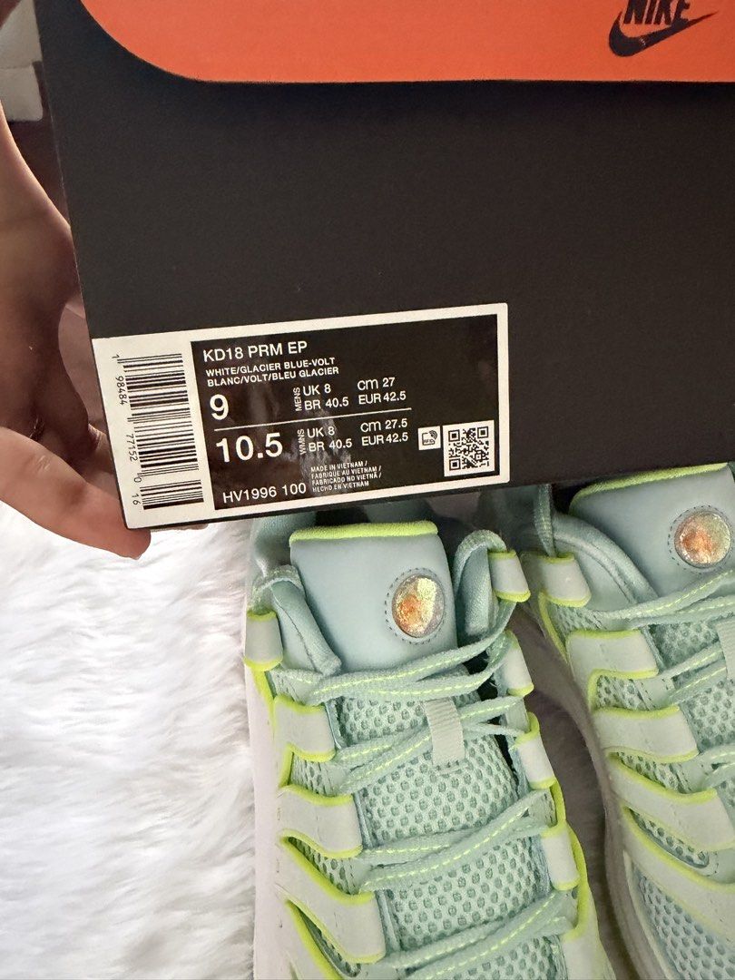 Nike KD18 PRM EP White Glacier Blue Volt (Category: Sneakers) located in Paranaque City. Submitted by ulscxz18 (Listing ID 1470828447, Image 2). Description: - Brand: Nike KD18 PRM EP Basketball Shoes - Colorway: White, Glacier Blue, and Volt - Size: Men's US 9 / Women's US 10.5 - Condition: Brand new with original box included - Inclusions: Extra yellow laces still attached in plastic - Key Features: Breathable mesh upper, supportive overlay lac