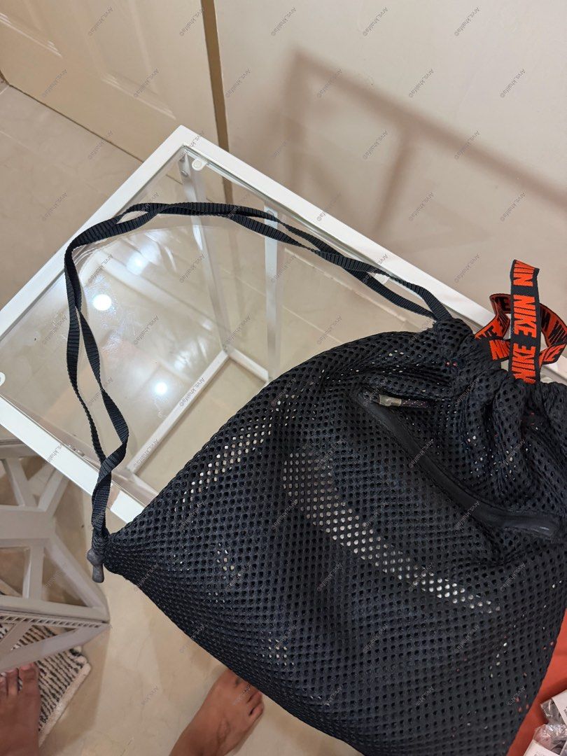 Nike Mesh Drawstring Backpack Black Orange (Category: Backpacks) located in Rosario. Submitted by chippycoco (Listing ID 1470767149, Image 2). Description: - Brand: Nike Ivy park - Color: Black mesh drawstring - Ideal for: Gym sessions, sports, or casual everyday carry - Condition: Excellent/Ready to ship.