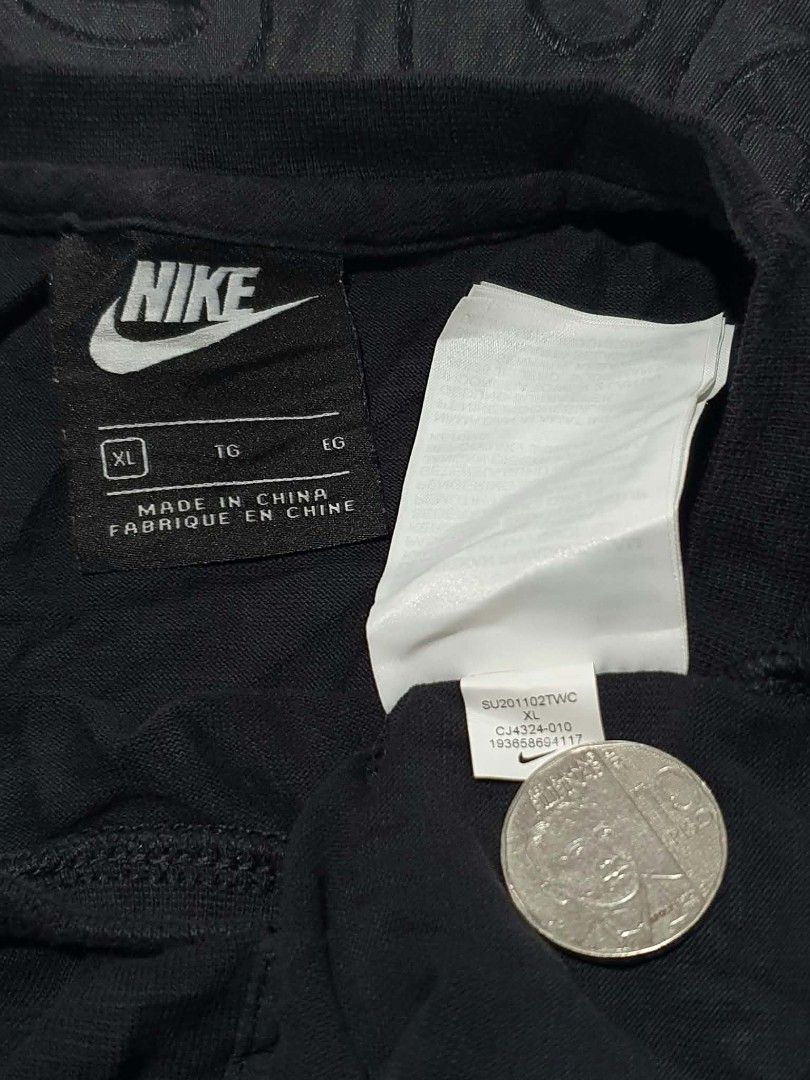 Nike Pocket T-Shirt Black (Category: Tshirts & Polo Shirts ) located in Manila. Submitted by tristan12_13 (Listing ID 1470891260, Image 3). Description: - Brand: Nike - Style: Utility tee with zippered left chest pocket and white logo patch - Size: XL on tag Dimensions: Width- 21 / Length- 29 - Color: Black - Material: Comfortable cotton blend - Fit: Standard crew neck - Product Code: CJ4324-010 - Condition: Brand new / Excellent everyday wear.