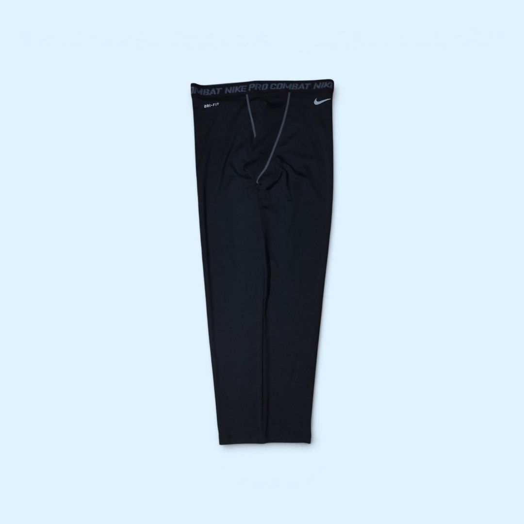 Nike Pro Combat Dri-Fit Compression Tights Size XL (Category: Activewear) located in Tayabas. Submitted by jthriftshop. (Listing ID 1470859115, Image 1). Description: - Brand: Nike Pro Combat - Size: XL - Color: Black with grey contrast stitching and white Nike Swoosh - Material: Dri-Fit fabric to keep you dry and comfortable - Features: Elastic waistband with bold Nike Pro Combat branding - Condition: Clean with inside tags attached - Ideal for: