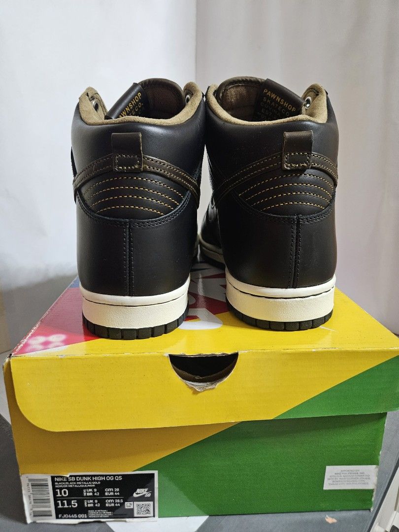 Nike SB Dunk High "Pawnshop" (Category: Sneakers) located in Manila. Submitted by gcv237. (Listing ID 1470884217, Image 3). Description: Nike SB Dunk High "Pawnshop" FJO445-001 ✅💯 Original Original Box w/ 2 Extra Lace and Wrapper ➕ Price: 4,500 (negotiable) Size: US - 10 / EUR - 44 Condition: 9.5/10 As good as new MOD: Lalamove or Grab | Meetup MOP: Gcash or Cash PM for more inquiries Can send more pictures 🖼️ Online almost everyday, will try t