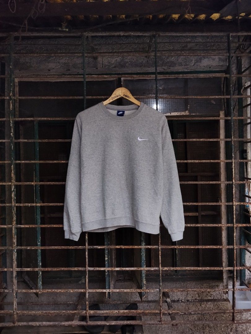 Nike Side Swoosh Crewneck Gray (Category: Coats, Jackets and Outerwear) located in Pasay City. Submitted by swoosh_collector (Listing ID 1470800280, Image 1). Description: Nike Side Swoosh Crewneck Gray • Size Medium on tag Best fit to Small • Dimes W 19 | L 25 • 9.5/10 Colorate • Excellent Condition • Authentic Original • Complete Tags • No issue DM for more info 📩.