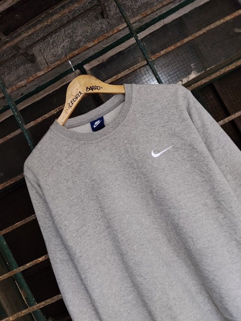 Nike Side Swoosh Crewneck Gray (Category: Coats, Jackets and Outerwear) located in Pasay City. Submitted by swoosh_collector (Listing ID 1470800280, Image 2). Description: Nike Side Swoosh Crewneck Gray • Size Medium on tag Best fit to Small • Dimes W 19 | L 25 • 9.5/10 Colorate • Excellent Condition • Authentic Original • Complete Tags • No issue DM for more info 📩.