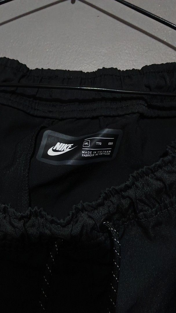Nike Tech Sweatpants Track Pants Size XXL (Category: Joggers) located in Marikina City. Submitted by thebasement_ (Listing ID 1470878664, Image 2). Description: - Brand: Nike - Color: Black - Size: XXL - Origin: Made in Vietnam original - Waistband: Elastic with adjustable speckled drawstrings - Branding: Subtle printed Nike logo on the left leg - Condition: Excellent / Ready to wear - Ideal for: Everyday comfort and athletic use.