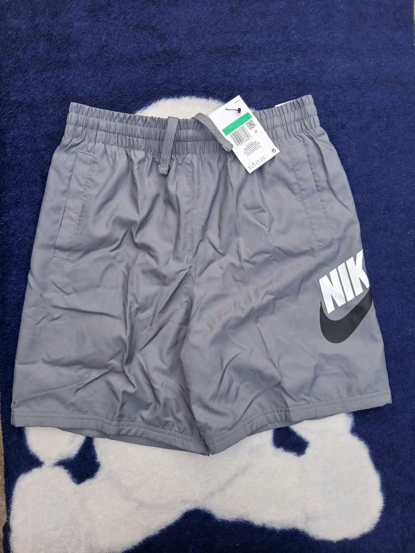 nike woven club short (Category: Shorts) located in Tigaon. Submitted by roland0402 (Listing ID 1470834207, Image 1). Description: nike club woven short heat gray color way youth XL best fit small adult waist:31 to 32 Lenght 18inch above the knee /leg opening:2*10 inches /heps 2* 14 brandnew and original 10x moneyback if proven fake and hindi brandnew.