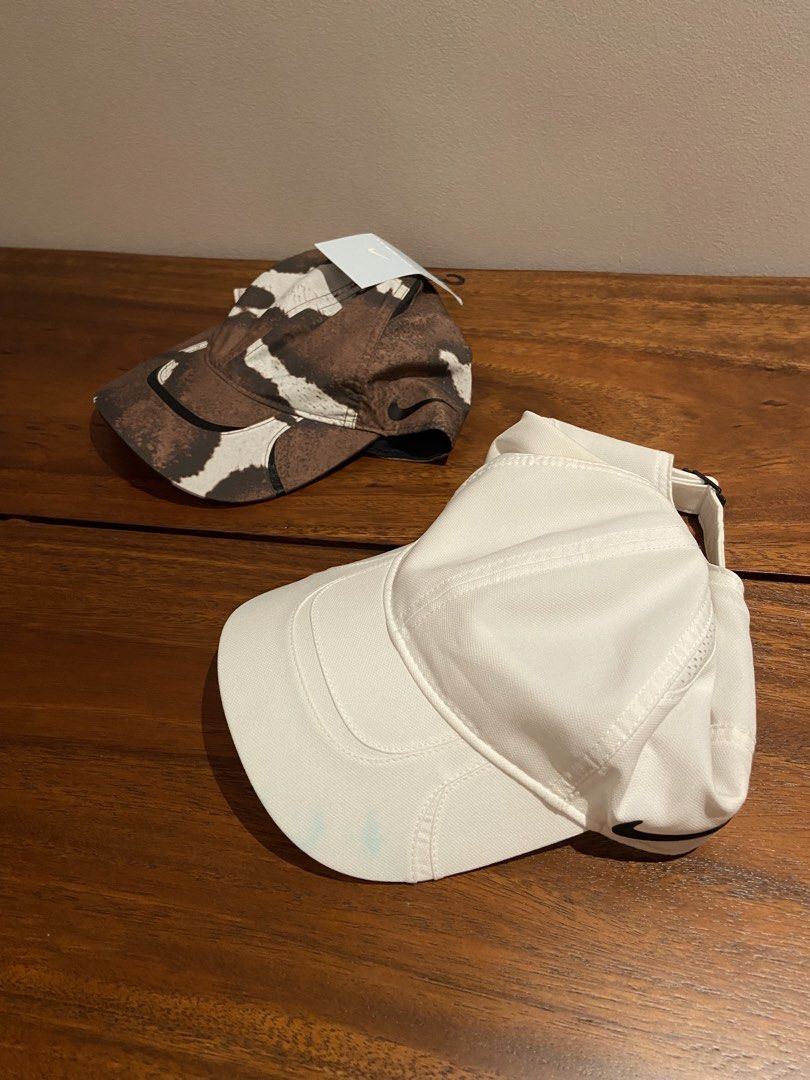 nike x nocta (Category: Caps & Hats) located in Manila. Submitted by martinmarggg (Listing ID 1470889962, Image 2). Description: nocta sz s/m brown bnwt 2.5k white used w minor stain 1.5k Php 3,500 for both.