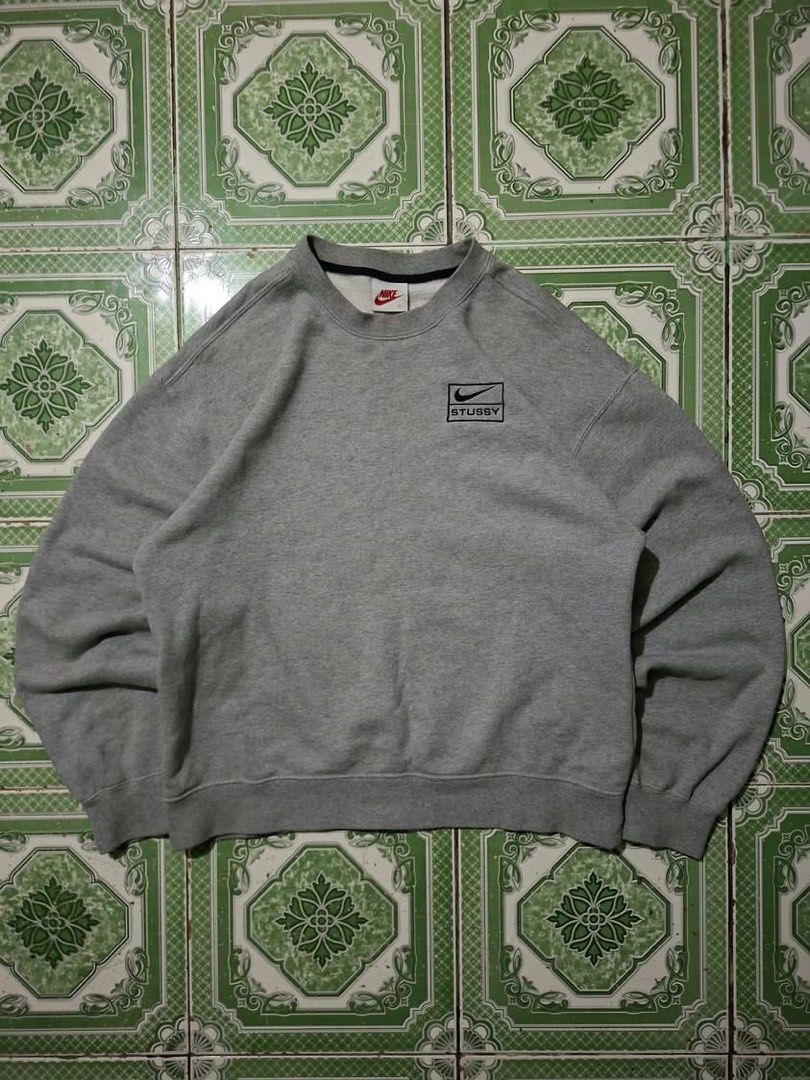 Nike x Stussy Sweater (Category: Coats, Jackets and Outerwear) located in Bulacan. Submitted by bleue.finds (Listing ID 1470883134, Image 1). Description: Nike x Stussy Sweater 22.5 - width 26 - length - stain on sleeve removable - good condition - no other issues .