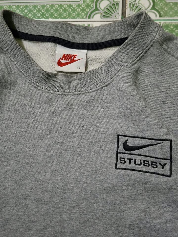 Nike x Stussy Sweater (Category: Coats, Jackets and Outerwear) located in Bulacan. Submitted by bleue.finds (Listing ID 1470883134, Image 2). Description: Nike x Stussy Sweater 22.5 - width 26 - length - stain on sleeve removable - good condition - no other issues .