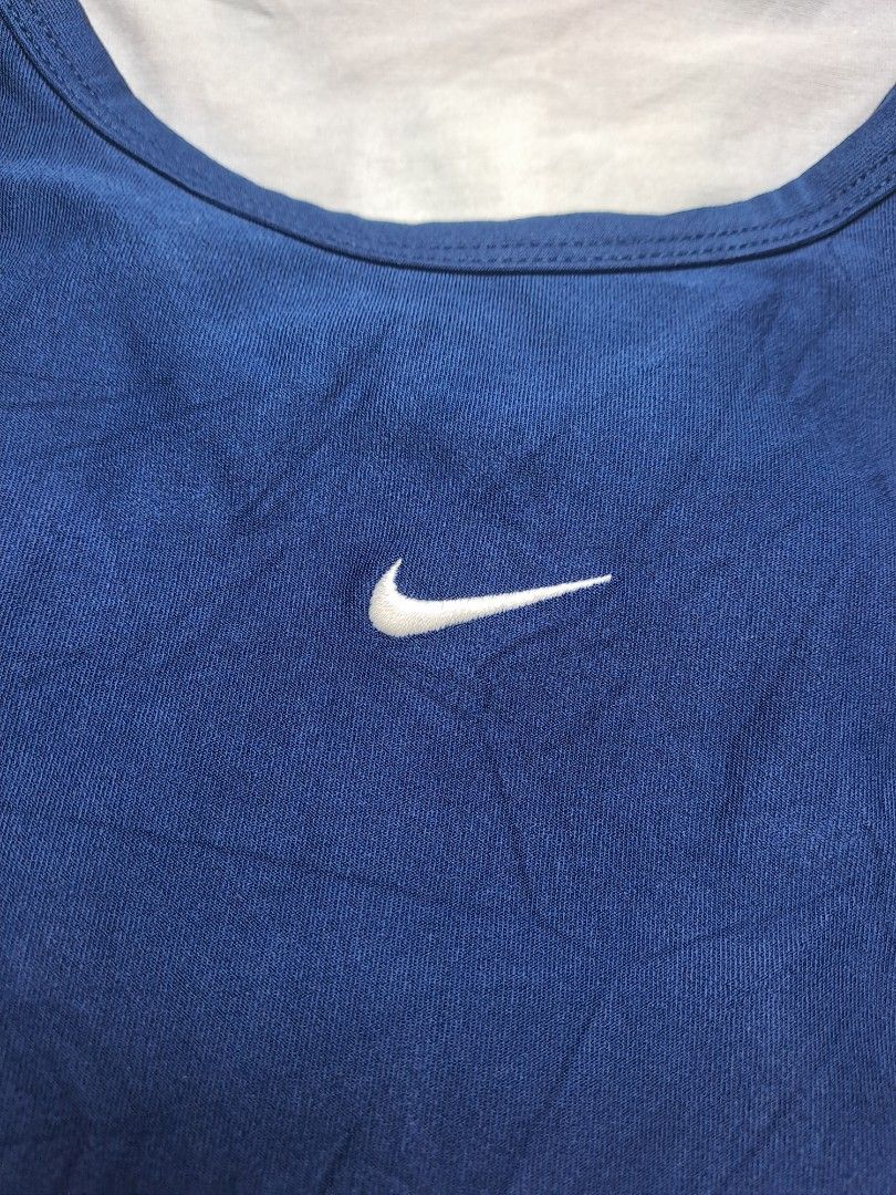 Nike Y2K sleeveless top (Category: Activewear) located in General Santos City (Dadiangas). Submitted by shinra322 (Listing ID 1470768581, Image 2). Description: Nike Sleeveless top Embroidered logo W14.5 L15 XS - fitted small No major flaws printed tag was faded Excellent condition Add SF .