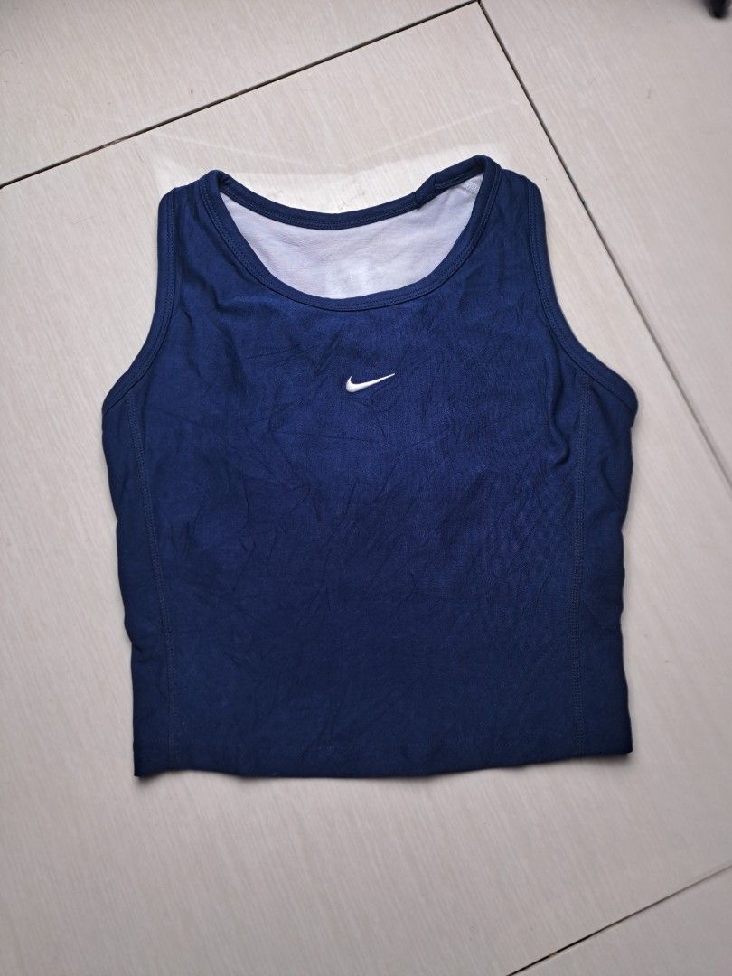 Nike Y2K sleeveless top (Category: Activewear) located in General Santos City (Dadiangas). Submitted by shinra322 (Listing ID 1470768581, Image 1). Description: Nike Sleeveless top Embroidered logo W14.5 L15 XS - fitted small No major flaws printed tag was faded Excellent condition Add SF .