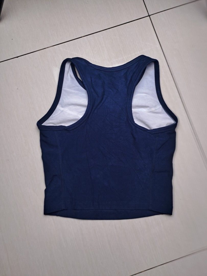 Nike Y2K sleeveless top (Category: Activewear) located in General Santos City (Dadiangas). Submitted by shinra322 (Listing ID 1470768581, Image 3). Description: Nike Sleeveless top Embroidered logo W14.5 L15 XS - fitted small No major flaws printed tag was faded Excellent condition Add SF .