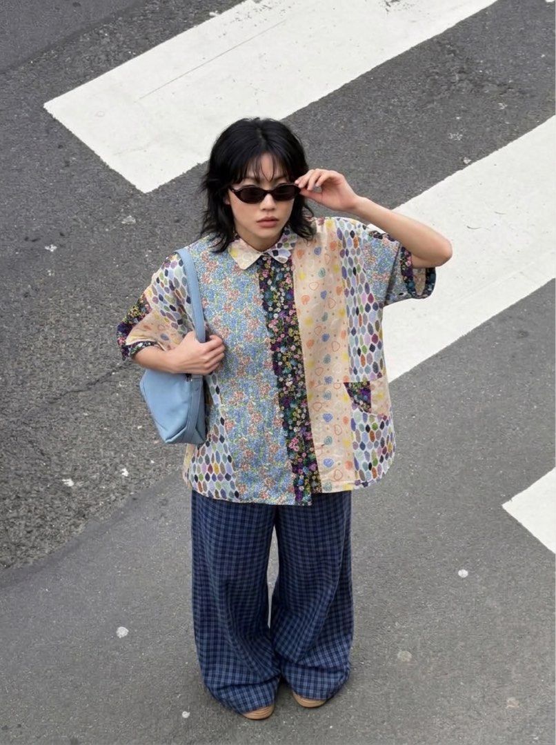 Niko And Oversized Patchwork Buttoned Top (Category: Blouses) located in Manila. Submitted by morningthrifters (Listing ID 1470852562, Image 1). Description: 📝This top is a niko and ... mixed patchwork pattern button-down shirt, heavily featuring a combination of vibrant floral panels, geometric diamond shapes, and a pastel doodle-heart print. Known for its oversized, relaxed Japanese streetwear silhouette, this boxy short-sleeve top combines a 