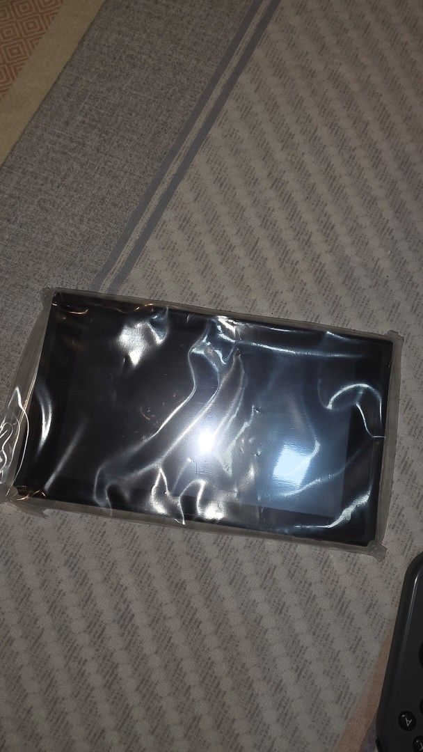 Nintendo Switch 1 Console Grey Joy-Con (Category: Nintendo) located in Las Pinas. Submitted by sixtosengson (Listing ID 1470929193, Image 3). Description: - Item: Nintendo Switch Console (Grey) - Inclusions: Console unit, matching Joy-Con controllers, and original packaging box with complete accessories (ALL STOCK) - Condition: Hardware still wrapped in plastic sleeves - ISSUE: one button in right Joycon is not working (just replace on your own) 