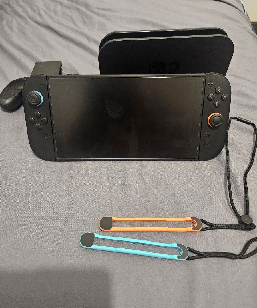 Nintendo Switch 2 (Category: Nintendo) located in Taguig. Submitted by sozwail (Listing ID 1470832246, Image 1). Description: comes with no box but complete accessories. also with a carry case.