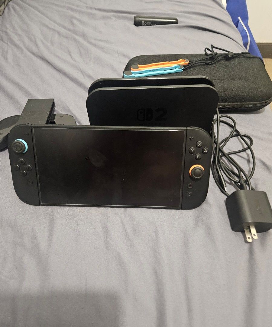 Nintendo Switch 2 (Category: Nintendo) located in Taguig. Submitted by sozwail (Listing ID 1470832246, Image 2). Description: comes with no box but complete accessories. also with a carry case.