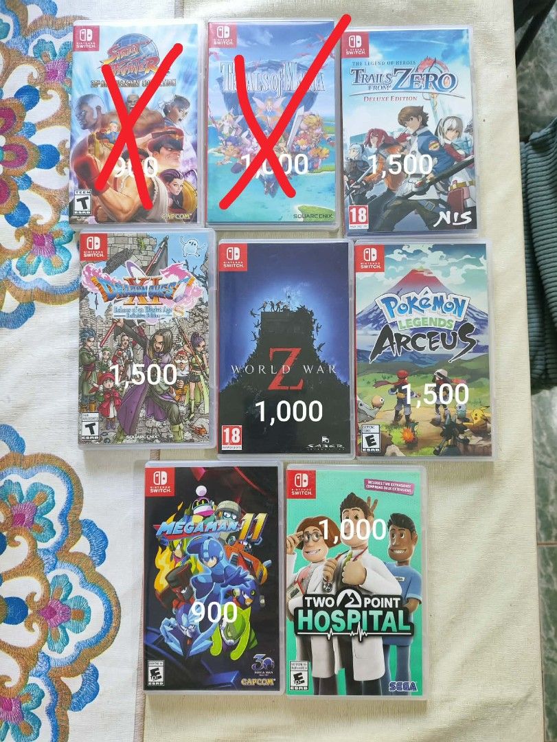 Nintendo Switch Games Various Titles (Category: Nintendo) located in Pasig City. Submitted by joanbiescas (Listing ID 1470860117, Image 1). Description: - Clearing out Nintendo Switch physical games - Available titles: Trails from Zero Deluxe Edition, Dragon Quest XI S, World War Z, Pokemon Legends Arceus, Megaman 11, Two Point Hospital - Condition: Cartridges and original cases included - Price range: ₱900 to ₱1,500 per game (individual prices m
