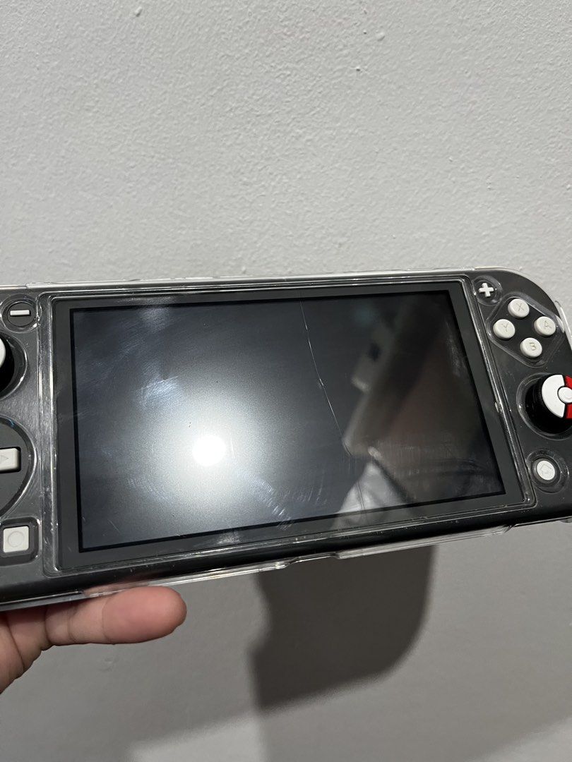 Nintendo Switch Lite JB 128gb (Category: Nintendo) located in Pasay City. Submitted by elyiahs (Listing ID 1470653613, Image 3). Description: Nintendo Switch Lite JB 128gb 7500 negotiable - Hairline crack on the digitizer (touchscreen glass) doesn't affect performance. - Replacement digitizer is only around ₱350 on Sh0pee if you want to replace it - No charger but any type-c charger will work. FREEBIES INCLUDED: - 2 protective cases - 1 carrying 