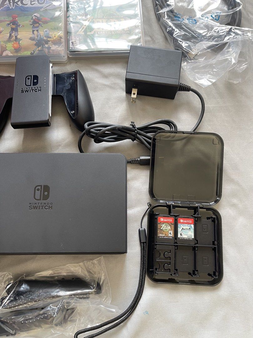 Nintendo Switch OLED Model with Games and Accessories (Category: Nintendo) located in Magallanes. Submitted by benchiie (Listing ID 1470809086, Image 3). Description: 🎮 FOR SALE: Nintendo Switch V1 OLED Model! 🎮 Looking for a new owner for my Nintendo Switch! ❤️ 📌 RFS: Need funds for processing requirements for work and hindi na nagagamit. ✨ INCLUSIONS: * ✅ Nintendo Switch V1 OLED * 🎮 2 Games: * The Legend of Zelda: Tears of the Kingdom * Pok