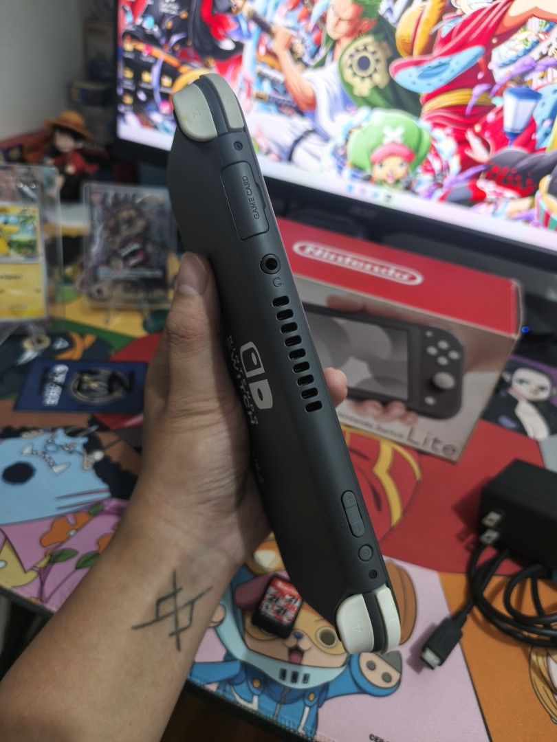 Nintendon switch lite (Category: Nintendo) located in San Juan City. Submitted by kciixd (Listing ID 1470815543, Image 3). Description: 🎮 NINTENDO SWITCH LITE — BUDGET MEAL WITH GAMES! ✅ Original Box ✅ Charger ✅ Travel Case / Bag ✅ NBA 2K21 — FREEBIE 📝 IMPORTANT NOTES: • Pre-owned unit • SanDisk Extreme 128GB microSD card sold separately for ₱1,200 • Pokémon Violet sold separately for ₱1,100 • NBA 2K21 physical game included as a freebie • Buye