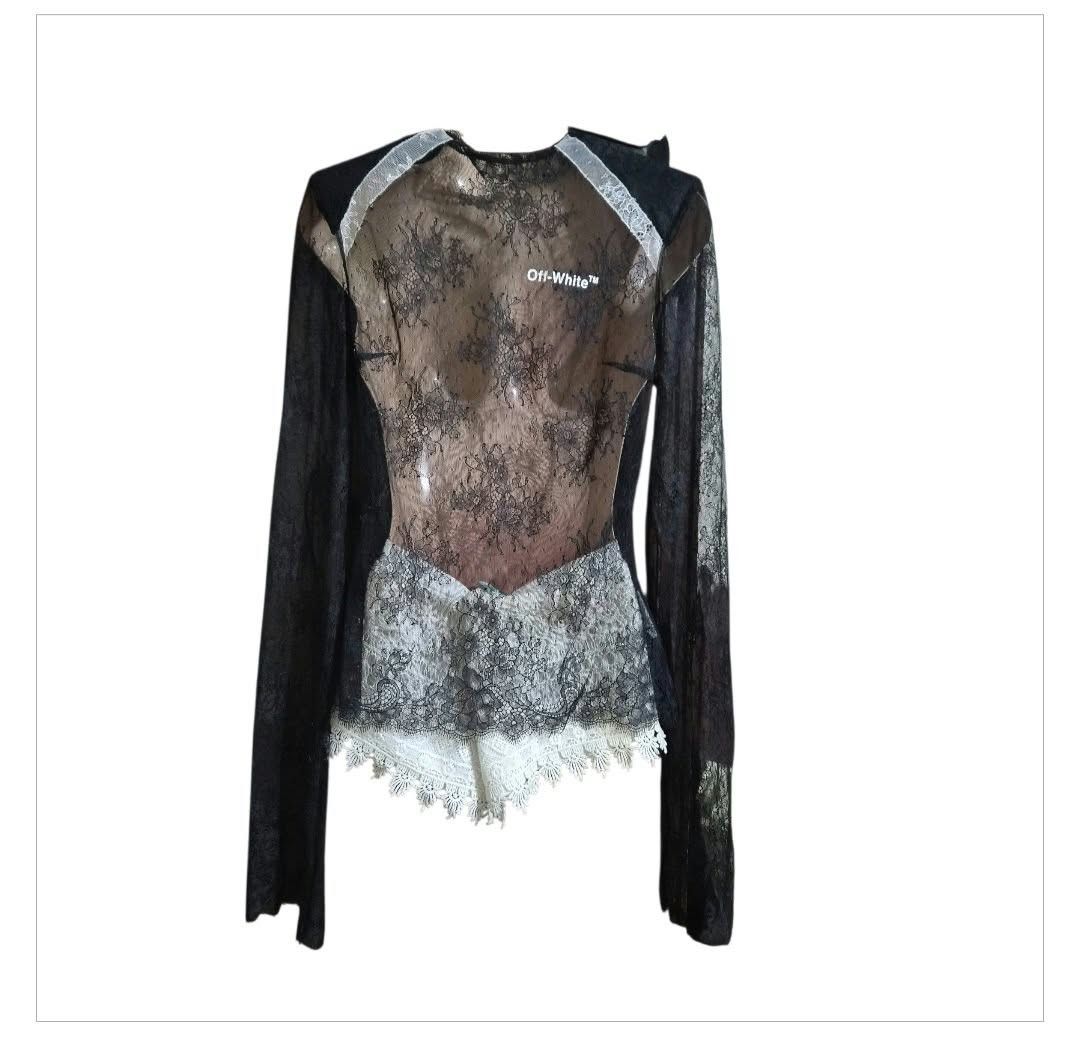 Off-White Black Lace Long Sleeve Zip Top (Category: Luxury Apparel) located in Paranaque City. Submitted by calm_youngstore7 (Listing ID 1470747843, Image 1). Description: 80% OFF RETAIL! LAST PICE SALE! - Brand: Off-White - Color: Black with white zip detail - Material: Sheer floral lace - Features: Long sleeves, prominent white front zipper - Condition: Brand new with original tags attached - Measurements: 16 inches across chest, 25 inches in l