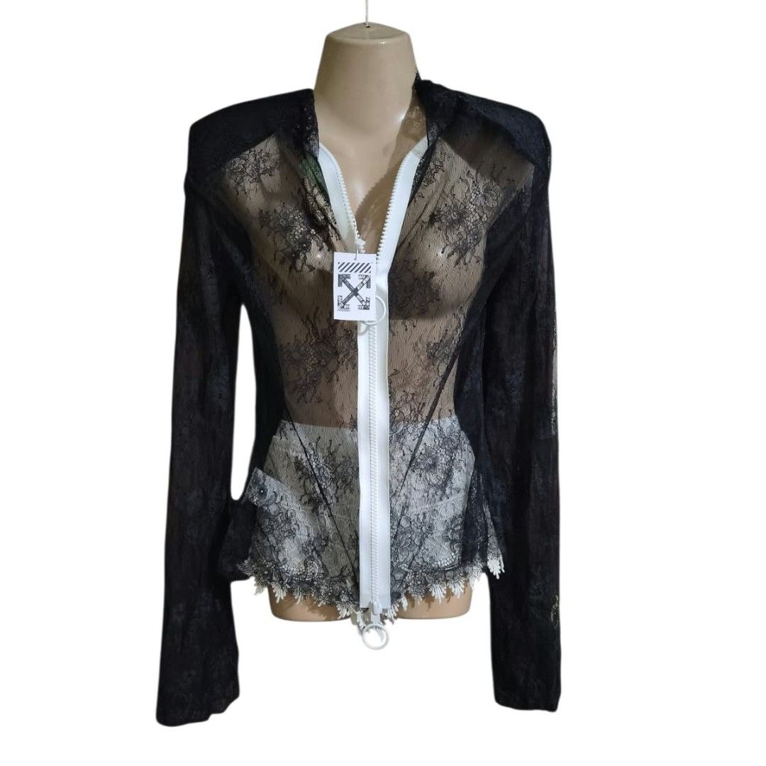 Off-White Black Lace Long Sleeve Zip Top (Category: Luxury Apparel) located in Paranaque City. Submitted by calm_youngstore7 (Listing ID 1470747843, Image 2). Description: 80% OFF RETAIL! LAST PICE SALE! - Brand: Off-White - Color: Black with white zip detail - Material: Sheer floral lace - Features: Long sleeves, prominent white front zipper - Condition: Brand new with original tags attached - Measurements: 16 inches across chest, 25 inches in l