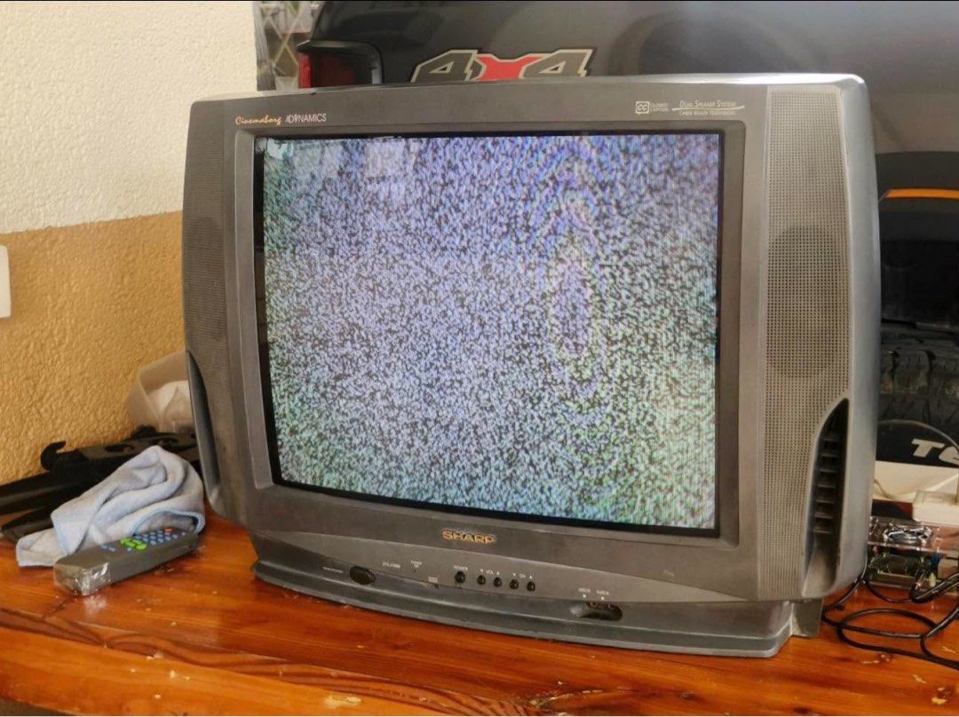 Old crt tv (Category: TV) located in Pasig City. Submitted by futuristicmom (Listing ID 1470889395, Image 3). Description: - Model: Sharp Colored TV - Condition: Powers on , input settings means video mode on po. With remote control din so may channels pero need ng cable to work out po ang channels (or antenna?) - Audio: Dual speaker system - Features: Cable ready, closed caption support, front buttons and dials, standard rear ports - Power: 110-