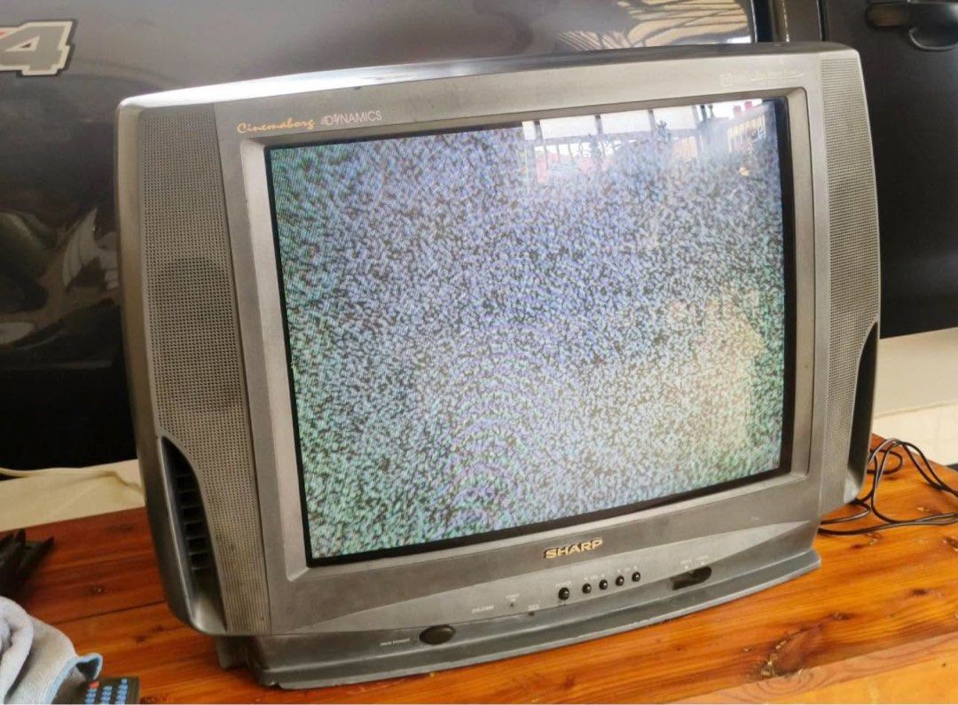 Old crt tv (Category: TV) located in Pasig City. Submitted by futuristicmom (Listing ID 1470889395, Image 2). Description: - Model: Sharp Colored TV - Condition: Powers on , input settings means video mode on po. With remote control din so may channels pero need ng cable to work out po ang channels (or antenna?) - Audio: Dual speaker system - Features: Cable ready, closed caption support, front buttons and dials, standard rear ports - Power: 110-