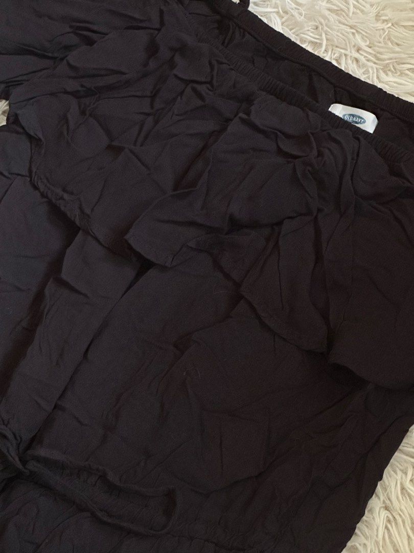 Old Navy Black Ruffle Jumpsuit Small (Category: Jumpsuits) located in Taguig. Submitted by appatheseller (Listing ID 1470846963, Image 3). Description: Fits L-Xl - Brand: Old Navy - Color: Black - Size: Small (S) - Style: Cold shoulder with ruffles and thin straps - Waist: Adjustable drawstring - Fabric: Comfortable and lightweight - Condition: Excellent - Perfect for: Casual outings and warm weather days.