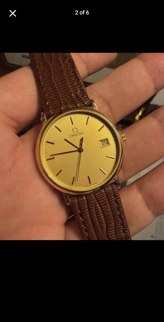 Omega Gold Dial Deville Quartz Wristwatch Brown Leather Strap (Category: Luxury Watches) located in Pasay City. Submitted by deal.point (Listing ID 1470826634, Image 2). Description: Watch and pouch only. Will be in the Philippines sa nov 4. Selling the same price. .