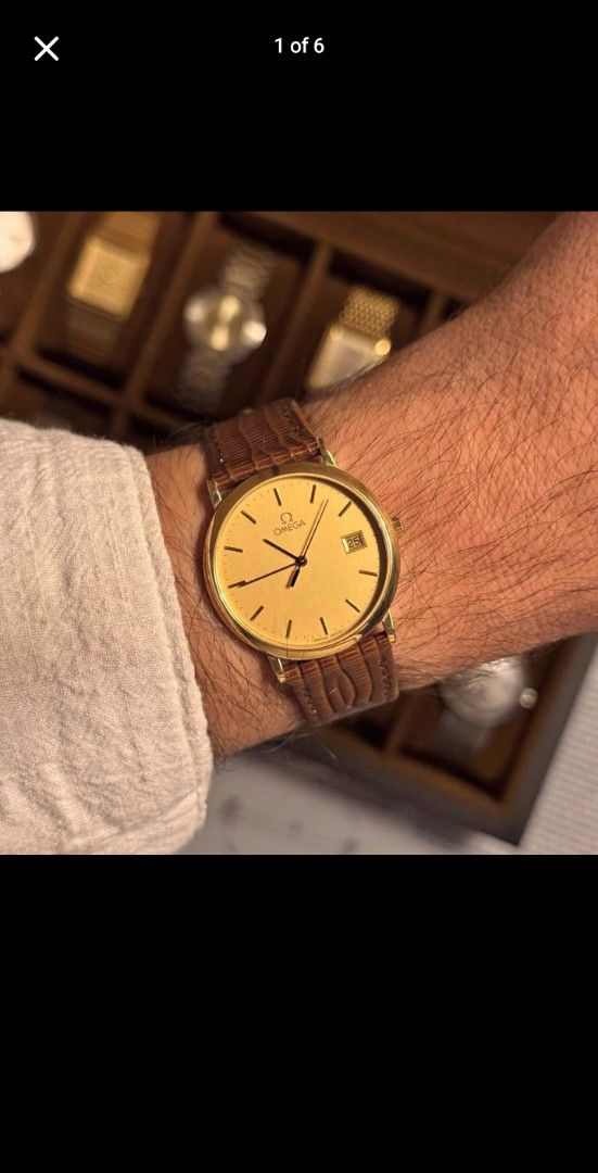Omega Gold Dial Deville Quartz Wristwatch Brown Leather Strap (Category: Luxury Watches) located in Pasay City. Submitted by deal.point (Listing ID 1470826634, Image 1). Description: Watch and pouch only. Will be in the Philippines sa nov 4. Selling the same price. .