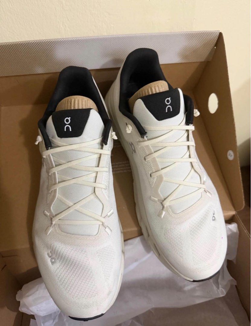 On Cloudtilt Pearl Ice Size US 11 (Category: Sneakers) located in Las Pinas. Submitted by calliahscorner (Listing ID 1470897988, Image 1). Description: - Model: On Cloudtilt - Colorway: Pearl Ice (White, cream, with black accents) - Size: Men's US 11 / EU 45 - Features: Lightweight cushioning sole design - Condition: Clean uppers and pristine tread Bought in China for 15,000 in peso Selling for only 10,000 Very Good Condition With original box an