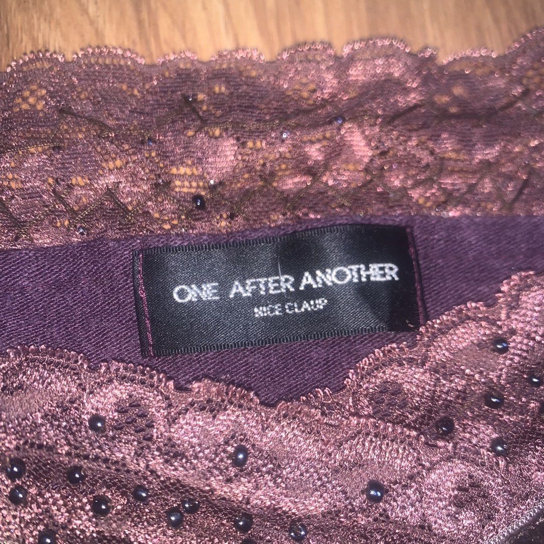 One After Another (Category: Sleeveless) located in Calauan. Submitted by randomthrift.womens (Listing ID 1470887543, Image 3). Description: One After Another purple & burgundy lace cami top with satin panel and lace trim.