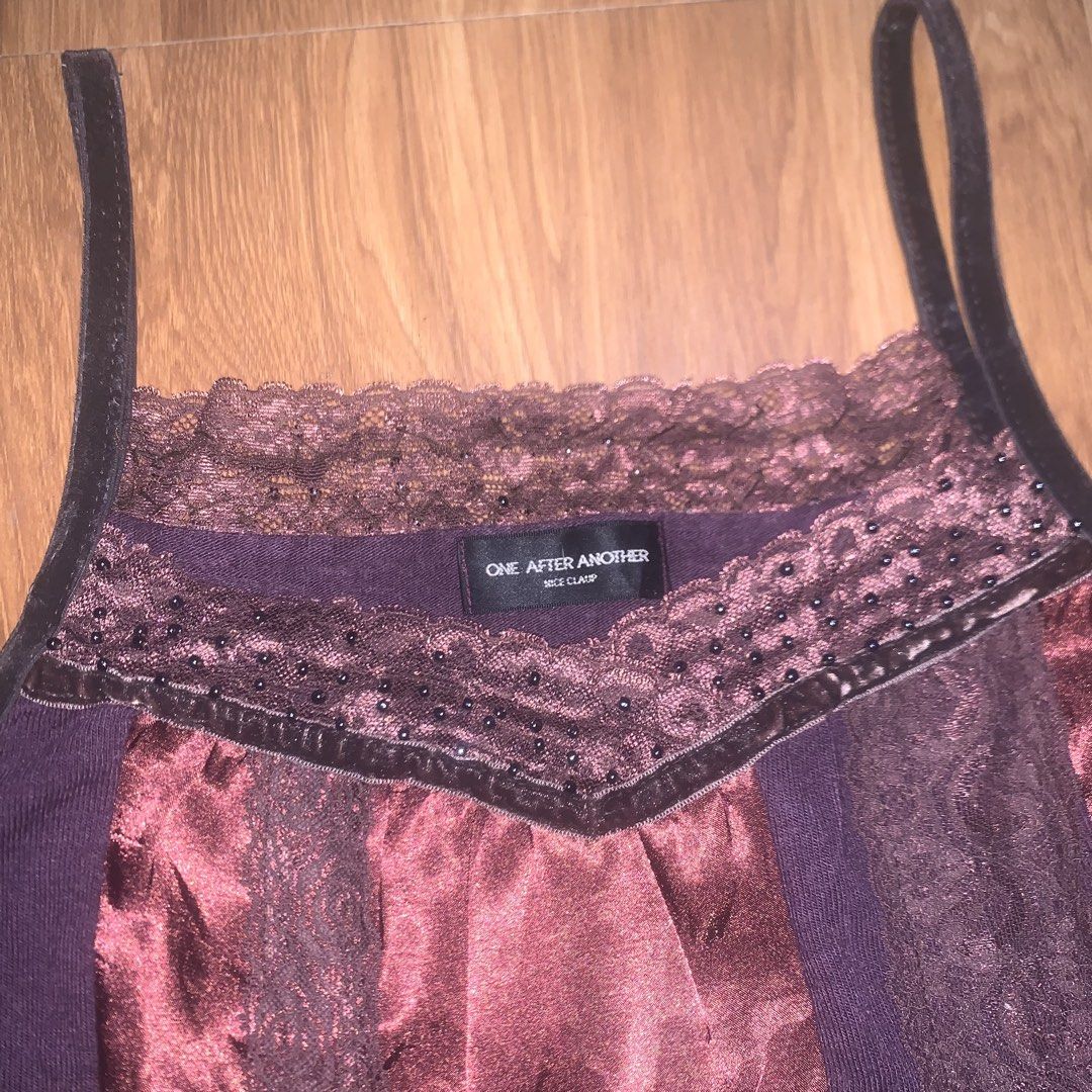 One After Another (Category: Sleeveless) located in Calauan. Submitted by randomthrift.womens (Listing ID 1470887543, Image 2). Description: One After Another purple & burgundy lace cami top with satin panel and lace trim.