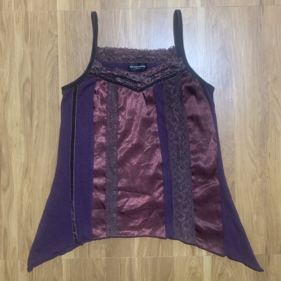 One After Another (Category: Sleeveless) located in Calauan. Submitted by randomthrift.womens (Listing ID 1470887543, Image 1). Description: One After Another purple & burgundy lace cami top with satin panel and lace trim.