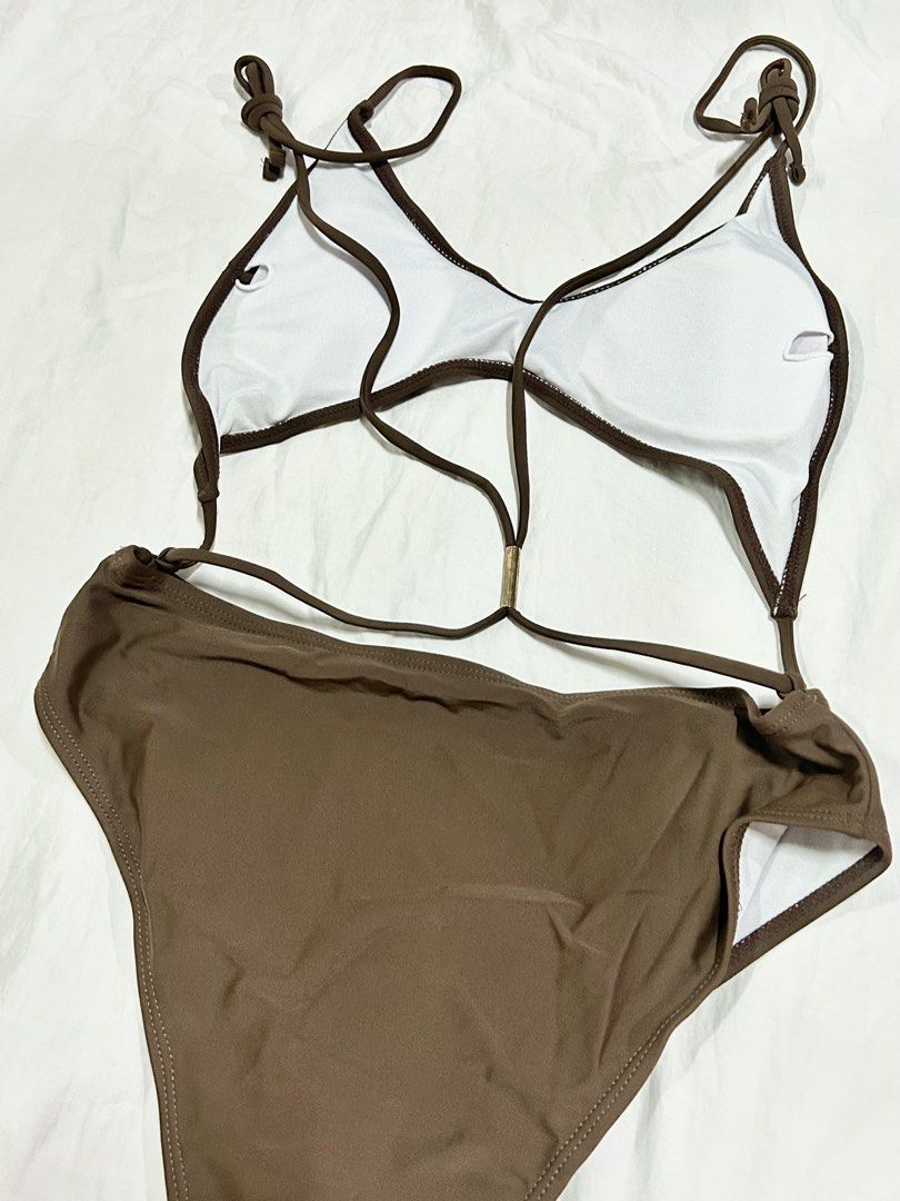 One Piece Brown Cut Out High Waist (Category: Bikinis & Swimsuits) located in Muntinlupa City. Submitted by _gudstuff (Listing ID 1470888018, Image 2). Description: - Style: One-piece bikini set (Triangle top & high-waisted cheeky bottom) - Features: Adjustable string straps, removable pads - Condition: Never been used but the gold accessory at the back has minimal scratches - Size: Standard fit.