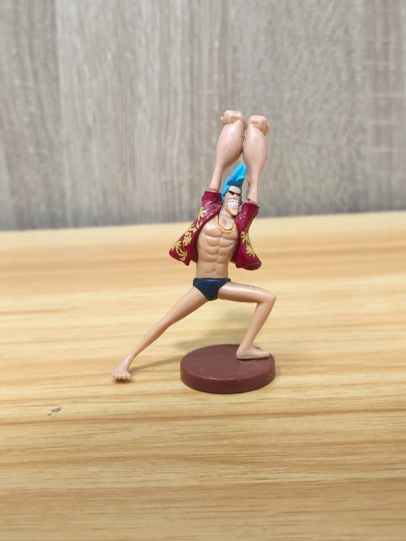 One Piece Franky Mini Figure Figurine (Category: Figurines & Statues) located in Santa Rosa. Submitted by tinytoycrate (Listing ID 1470925100, Image 1). Description: - Authentic-look One Piece Franky figurine in a classic hands-raised pose - Includes a sturdy small round brown base - Ideal display piece for anime fans and collectors for desks or shelves ⭐ Item is loose. ⭐ Item in good condition. ⭐ Authentic ⭐ What you see is what you get Disclaim
