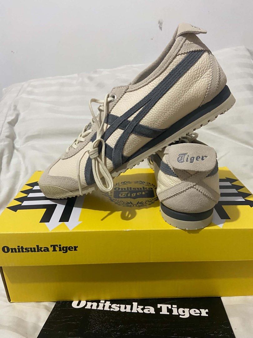 Onitsuka Tiger Mexico 66 SD VIN Birch Metropolis (Category: Sneakers) located in Manila. Submitted by stephajnienocos (Listing ID 1470838328, Image 1). Description: NEW! NEW! NEW! Never been used. - Brand: Onitsuka Tiger - Model: Mexico 66 SD VIN - Colorway: Birch/Metropolis - Materials: Premium tumbled leather upper with suede overlays and dark grey side stripes - Features: Distinctive heel flap with embroidered Tiger branding - Size: US Unisex 