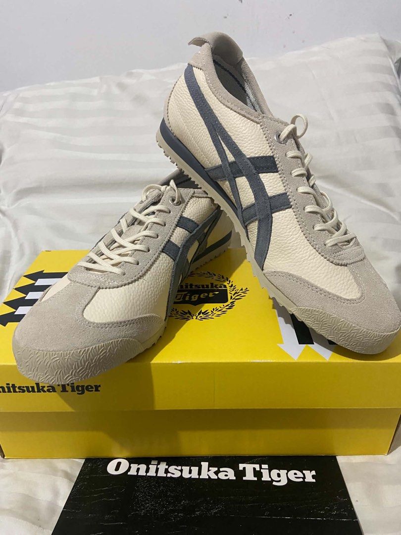 Onitsuka Tiger Mexico 66 SD VIN Birch Metropolis (Category: Sneakers) located in Manila. Submitted by stephajnienocos (Listing ID 1470838328, Image 2). Description: NEW! NEW! NEW! Never been used. - Brand: Onitsuka Tiger - Model: Mexico 66 SD VIN - Colorway: Birch/Metropolis - Materials: Premium tumbled leather upper with suede overlays and dark grey side stripes - Features: Distinctive heel flap with embroidered Tiger branding - Size: US Unisex 