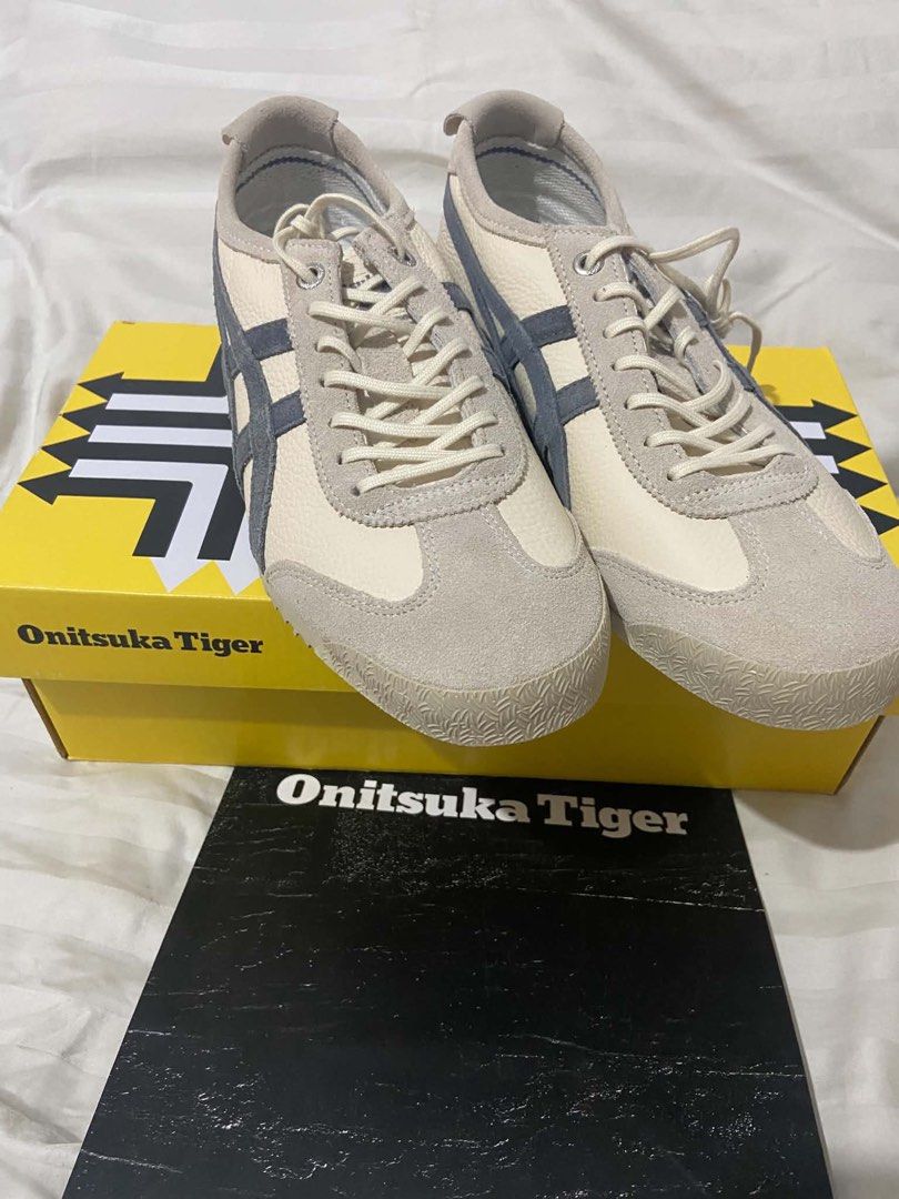 Onitsuka Tiger Mexico 66 SD VIN Birch Metropolis (Category: Sneakers) located in Manila. Submitted by stephajnienocos (Listing ID 1470838328, Image 3). Description: NEW! NEW! NEW! Never been used. - Brand: Onitsuka Tiger - Model: Mexico 66 SD VIN - Colorway: Birch/Metropolis - Materials: Premium tumbled leather upper with suede overlays and dark grey side stripes - Features: Distinctive heel flap with embroidered Tiger branding - Size: US Unisex 