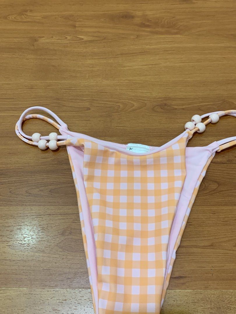 Orange Gingham Checkered Bikini Bottom with Beaded Straps (Category: Bikinis & Swimsuits) located in Quezon City. Submitted by whyisyellowyellow (Listing ID 1470801080, Image 2). Description: ⭐️ fits small to medium ⭐️ brand new ⭐️ never worn.