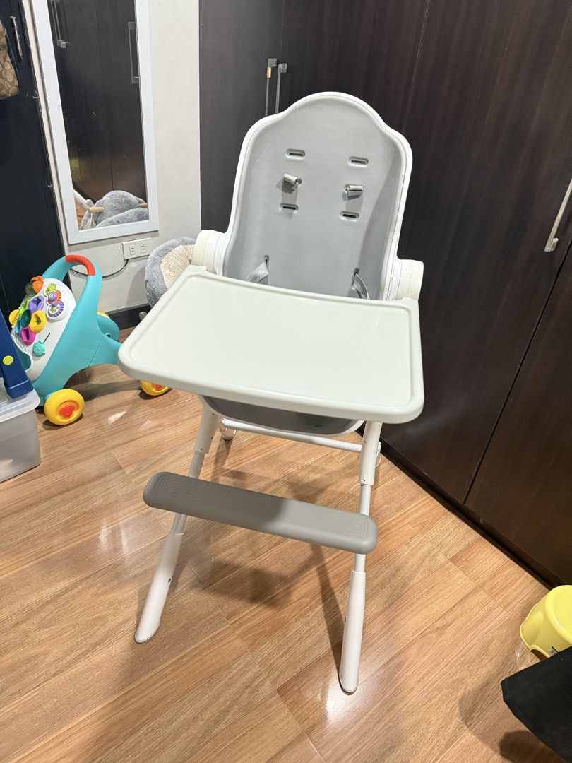 Oribel cocoon z high chair (Category: Baby High Chairs) located in Pasig City. Submitted by myclosetdiaries_ (Listing ID 1470919243, Image 1). Description: - Brand/Model: Oribel Cocoon Z High Chair in white and gray - Includes comfortable 2-in-1 seat cushion - Cosmetic issue: Sun-exposure burn mark on the right side of the table tray (does not affect usage or stability) - Secure harness system and adjustable footrest - Meetup available in Pasig C