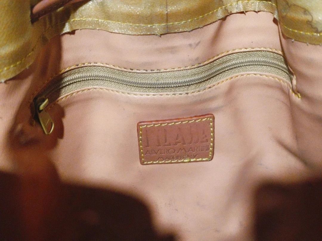 Original Alviero Martini (Category: Shoulder Bags) located in Cabuyao City. Submitted by your____lux____shop (Listing ID 1470874041, Image 3). Description: Sale❗Sale❗Sale❗ Original Alviero Martini VINTAGE Genuine leather trim w/ provided dustbag 📌First to pay.