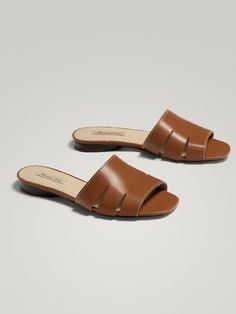 Original Massimo Dutti Brown Leather Flat Sandals Slides (Category: Flats & Sandals) located in Las Pinas. Submitted by drecessionista (Listing ID 1470882825, Image 2). Description: - Brand: Massimo Dutti - Style: Slip-on slide sandals with multi-strap cutouts - Details: Contrast white stitching, flat heel design - Insole: Clean beige inner sole with clear brand logo stamp - Condition: Great for everyday warm-weather wear - Shipping: Lalamove or 